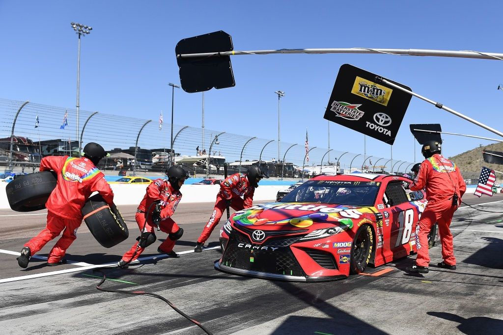 NASCAR tire change, Kyle Busch, driver of the #18 Skittles Toyota, pits during the Monster Energy NASCAR Cup Series TicketGuardian 500 at ISM Raceway on March 10, 2019 in Avondale, Arizona.