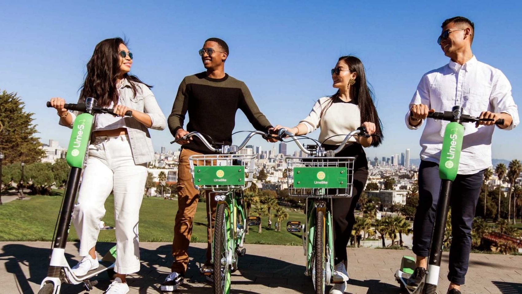 Millennials Riding Lime Scooters And Bikes