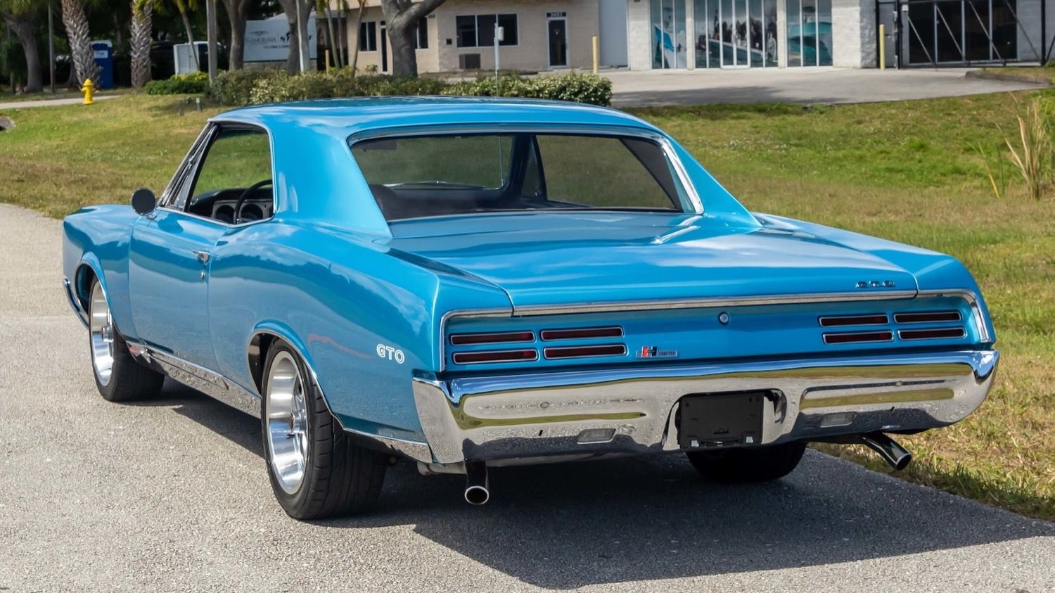 1967 Pontiac GTO parked on the side of the road