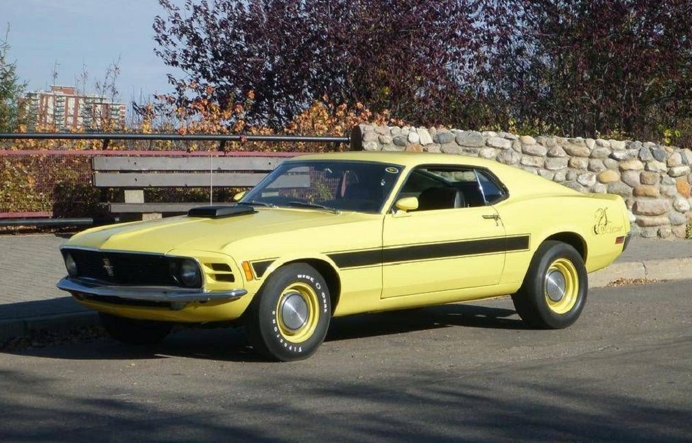 Yellow 1970 Ford Mustang Sidewinder Special on the side of a road