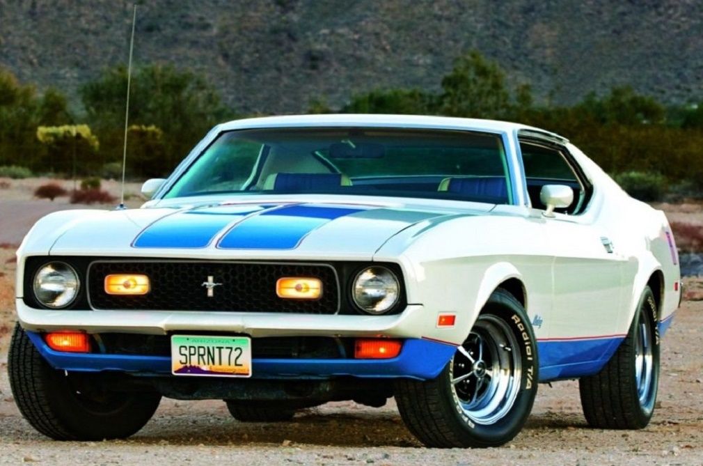 White and Blue 1972 Ford Mustang Sprint on the dirt