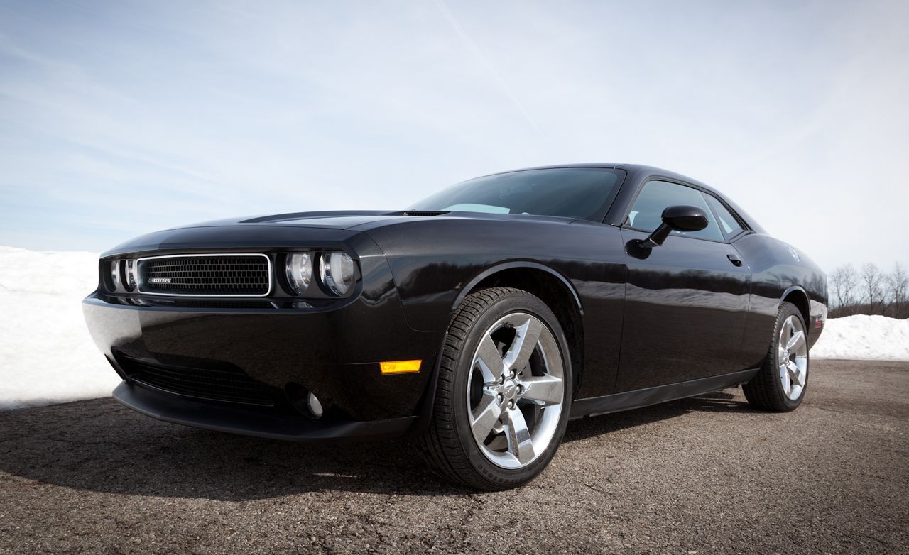 Brilliant Black Crystal Pearlcoat 2011 Dodge Challenger on a winter day