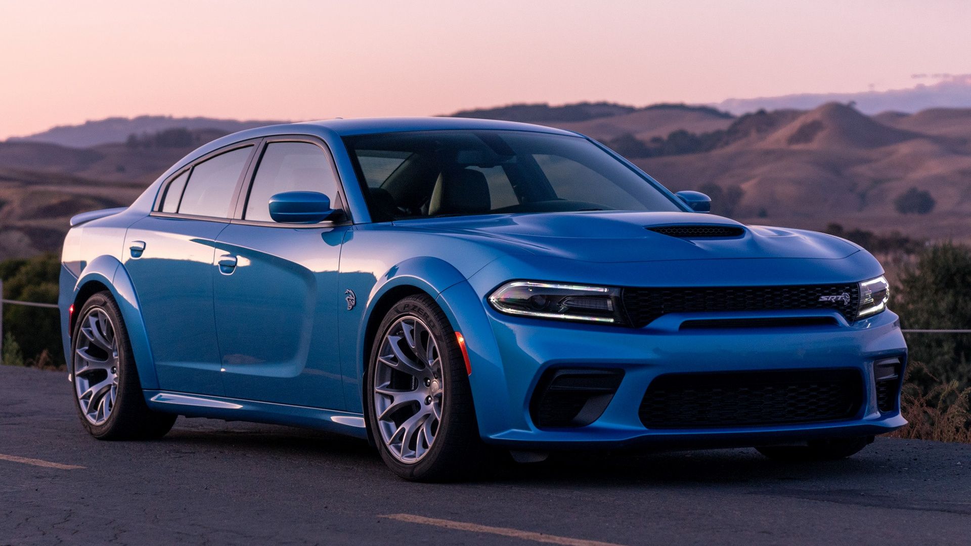 B5 Blue 2020 Dodge Charger Daytona 50th Anniversary Edition parked at the side of a road at dawn