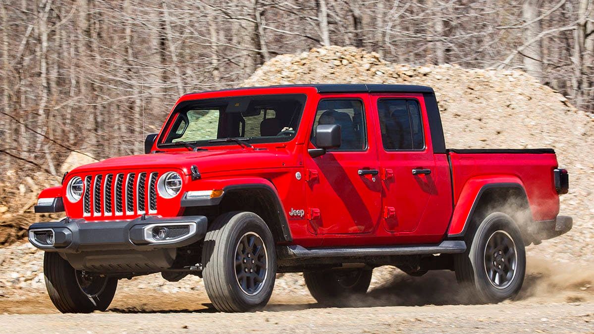 Firecracker Red Clear-Coat 2020 Jeep Gladiator raging the dirt road