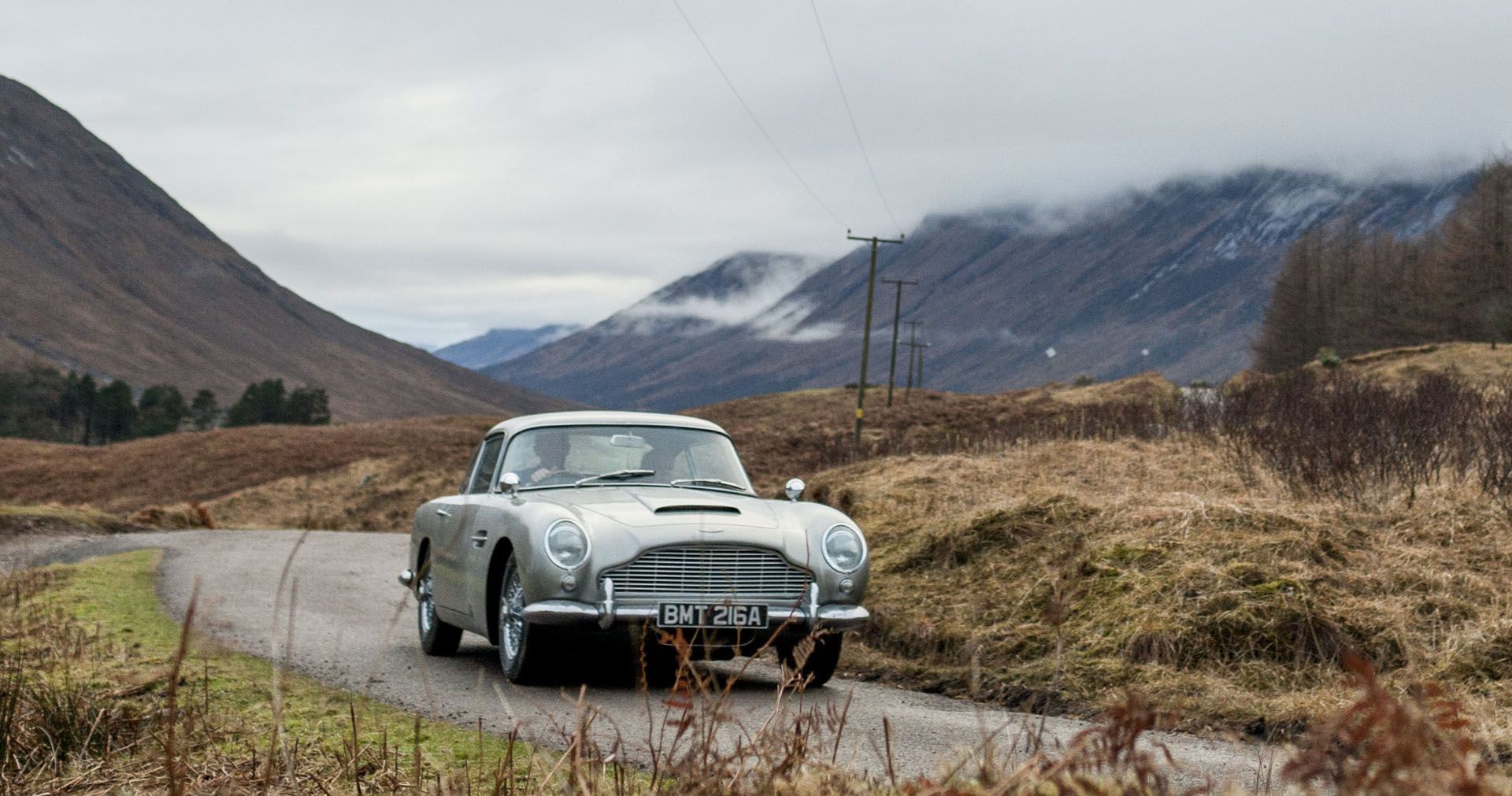 Aston Martin DB5 Goldfinger Continuation driving in valley