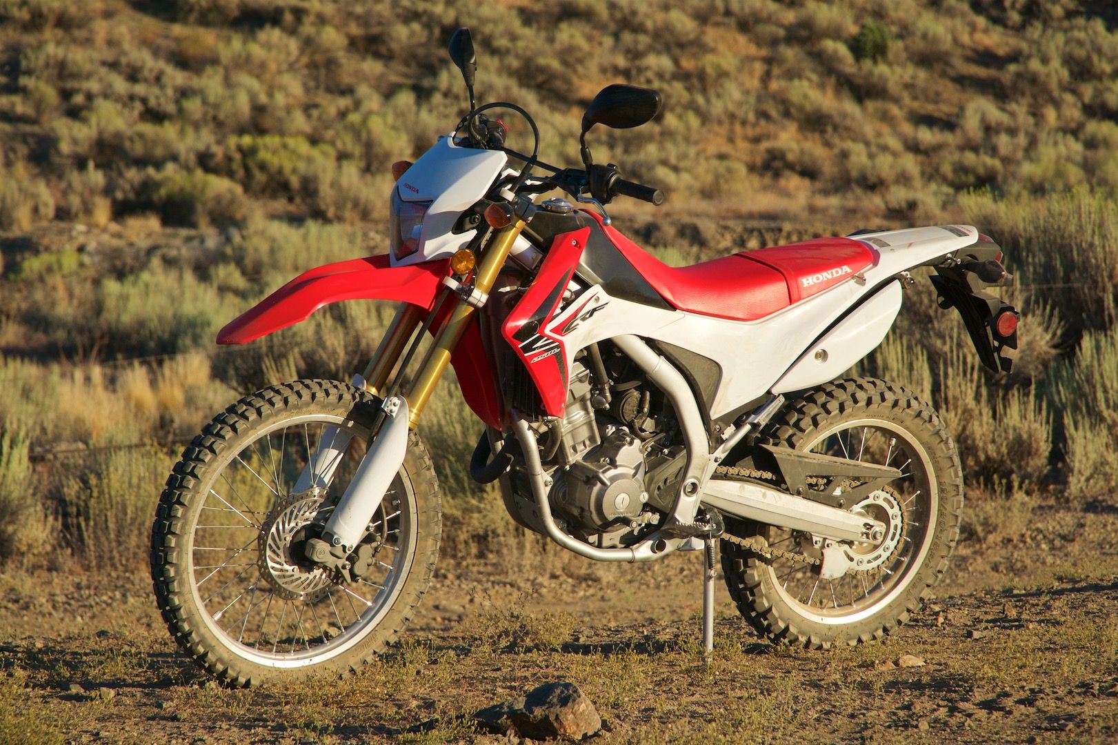 Honda CRF250L parked on a dirt road