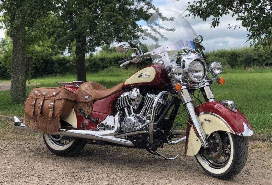 vintage looking Indian Chief parked outside