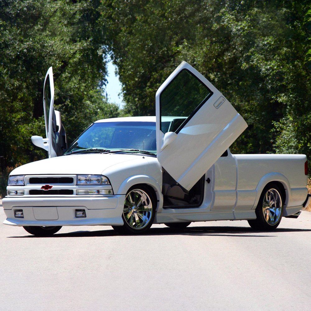 white chevy pickup truck with scissor doors