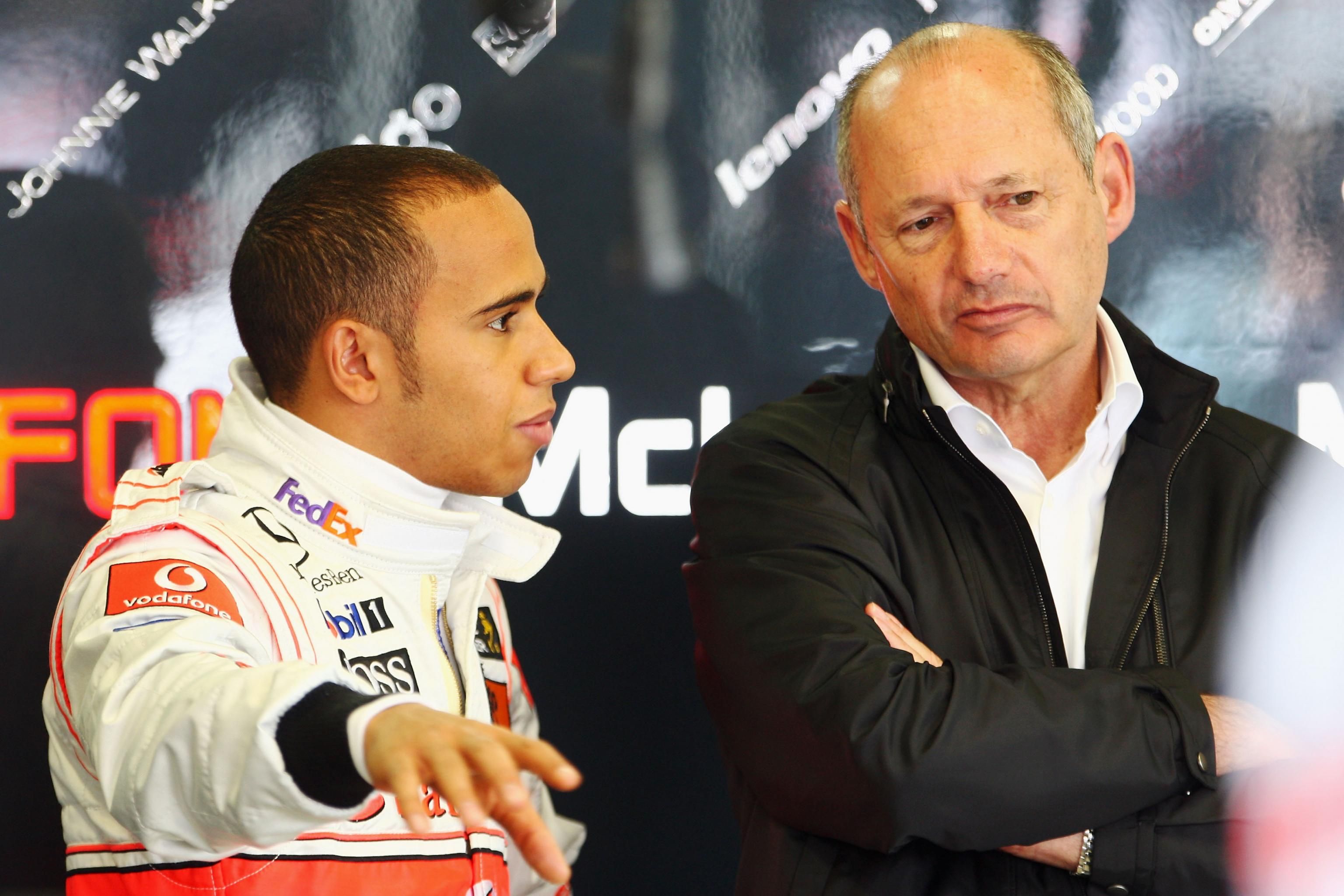 Lewis Hamilton and Ron Dennis in conversation during his McLaren days