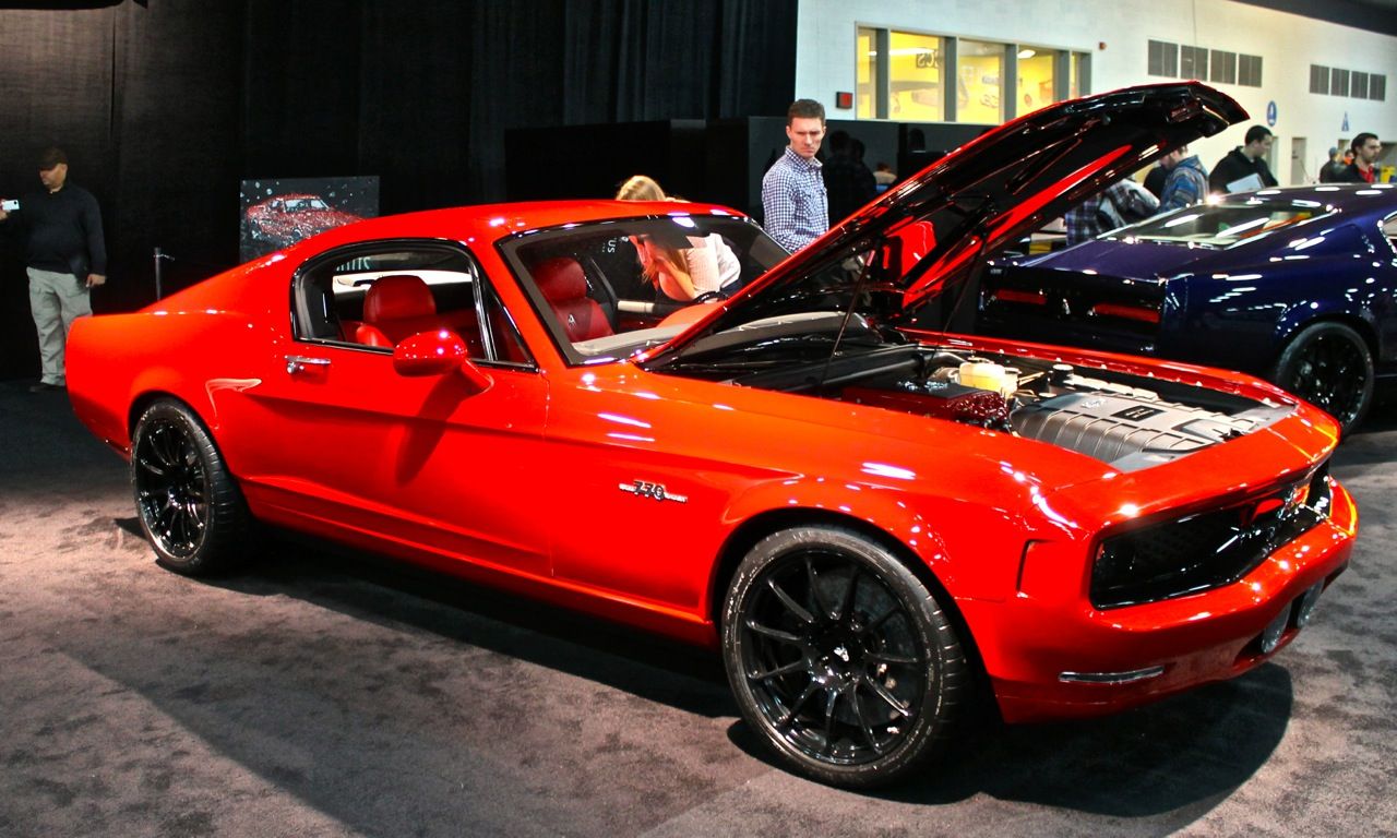 Open hood of a red Equus Bass 770 showing the Corvette engine