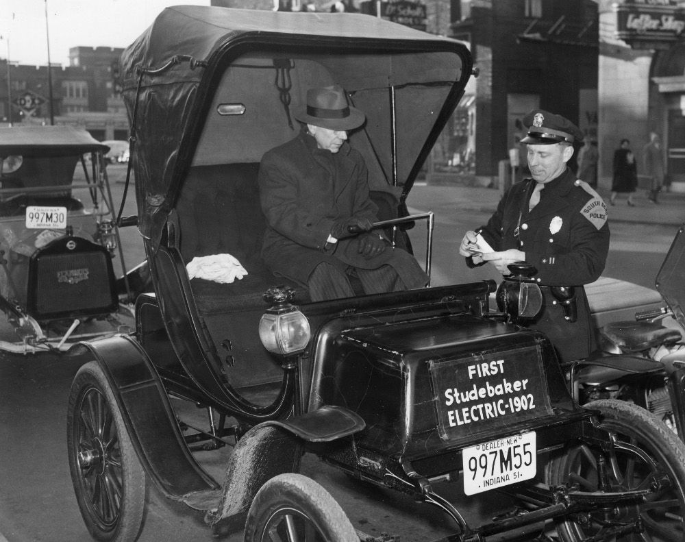 The first Studebaker Electric Car 1902 getting pulled over