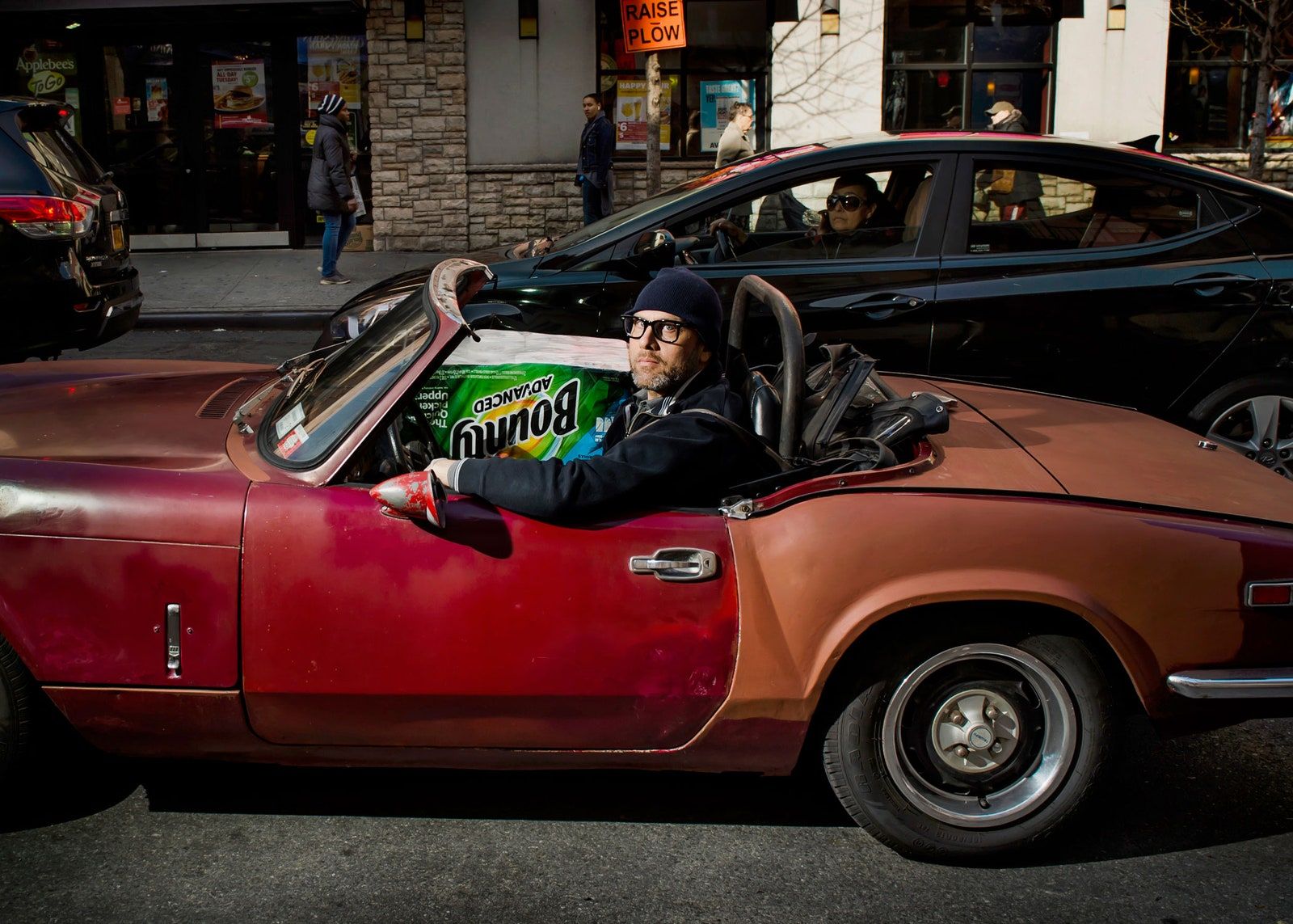 Convertible driver with groceries