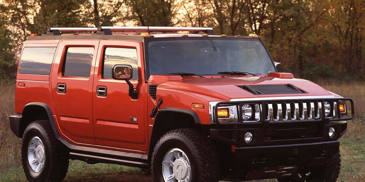 2003 Hummer H2 red four door with roof rack