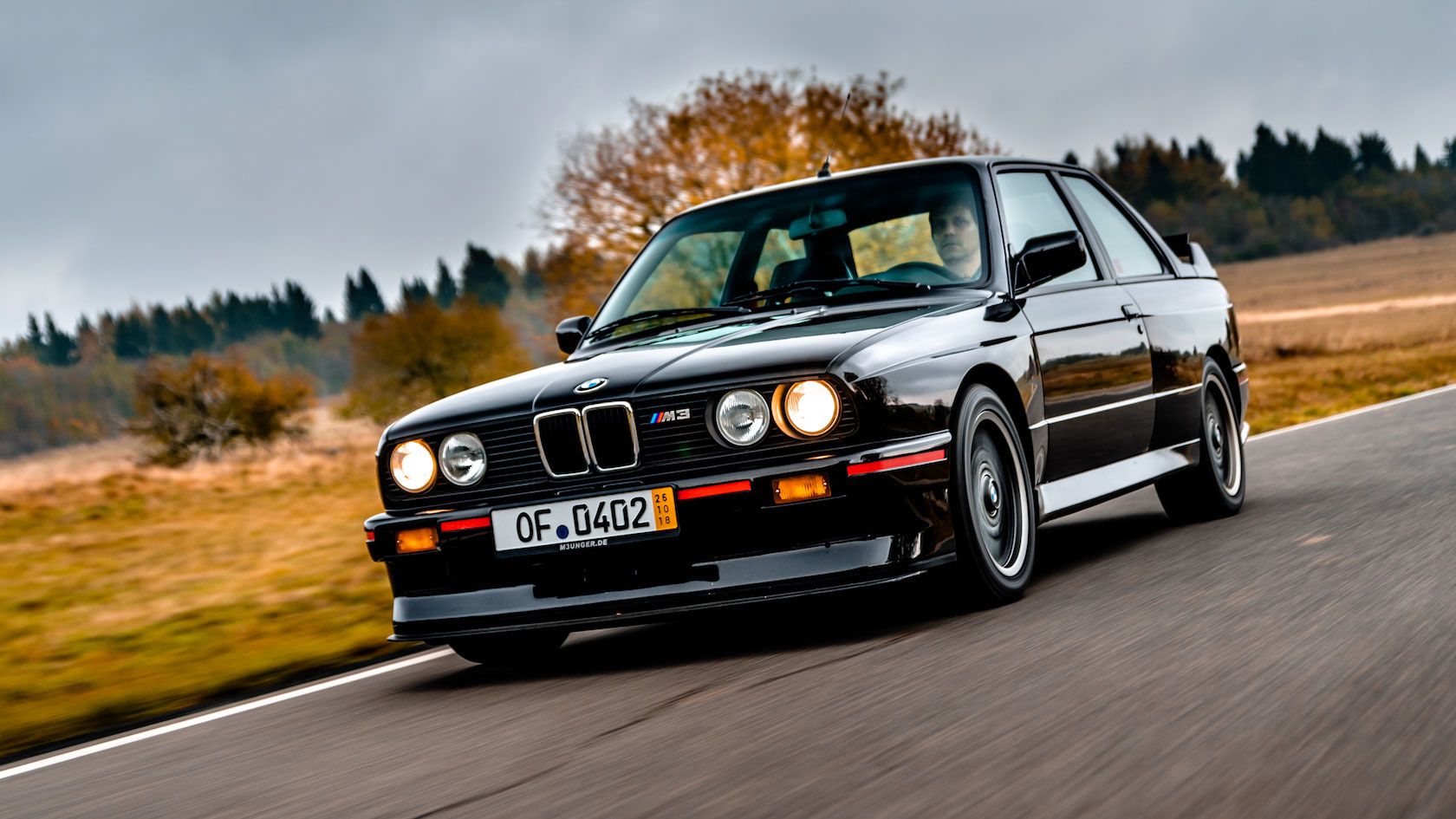 1990 BMW M3 Sport Evolution (E30) driving on the highway