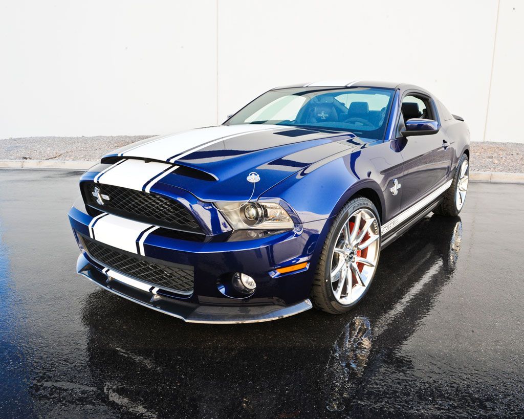 Kona blue 2012 Shelby Limited Edition Super Snake on the wet reflective floor