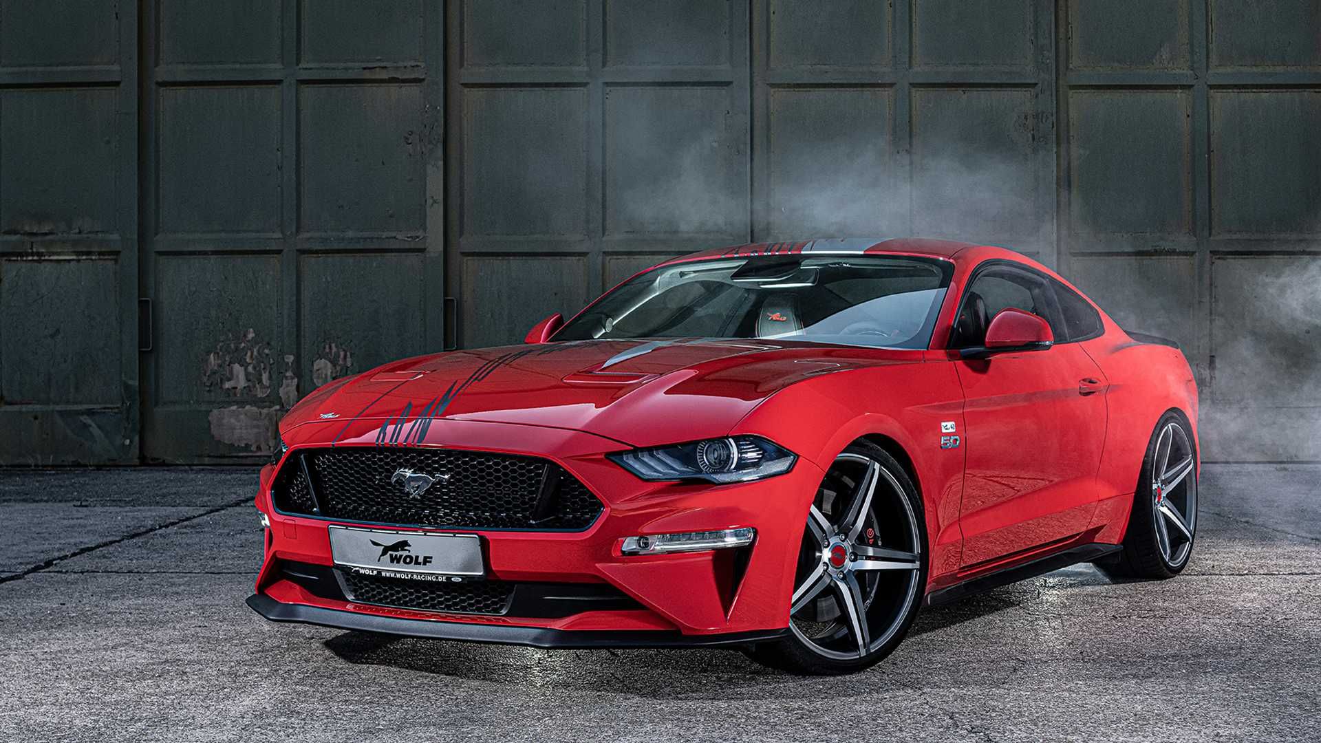 Rapid red metallic tinted clearcoat 2020 Wolf Racing Ford Mustang in a showroom