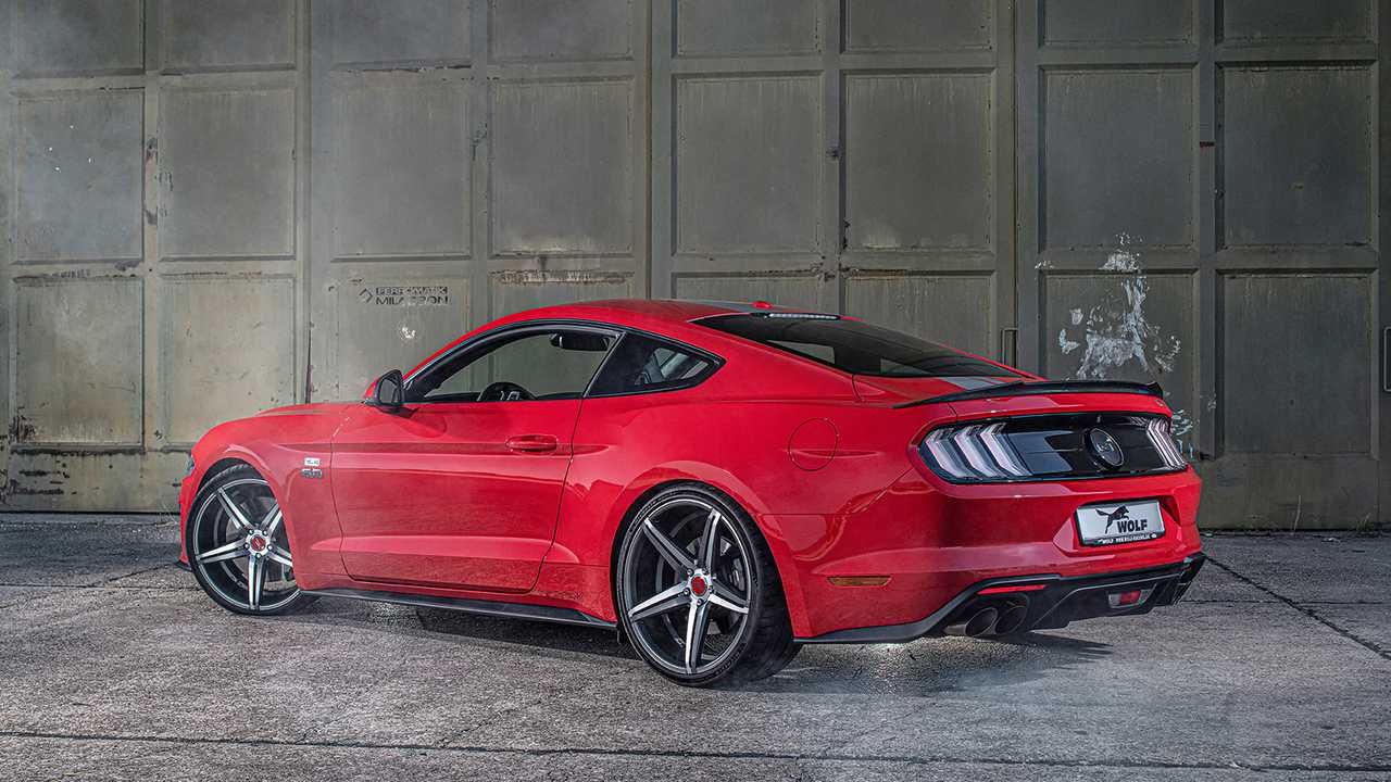Rapid red metallic tinted clearcoat 2020 Wolf Racing Ford Mustang in a showroom