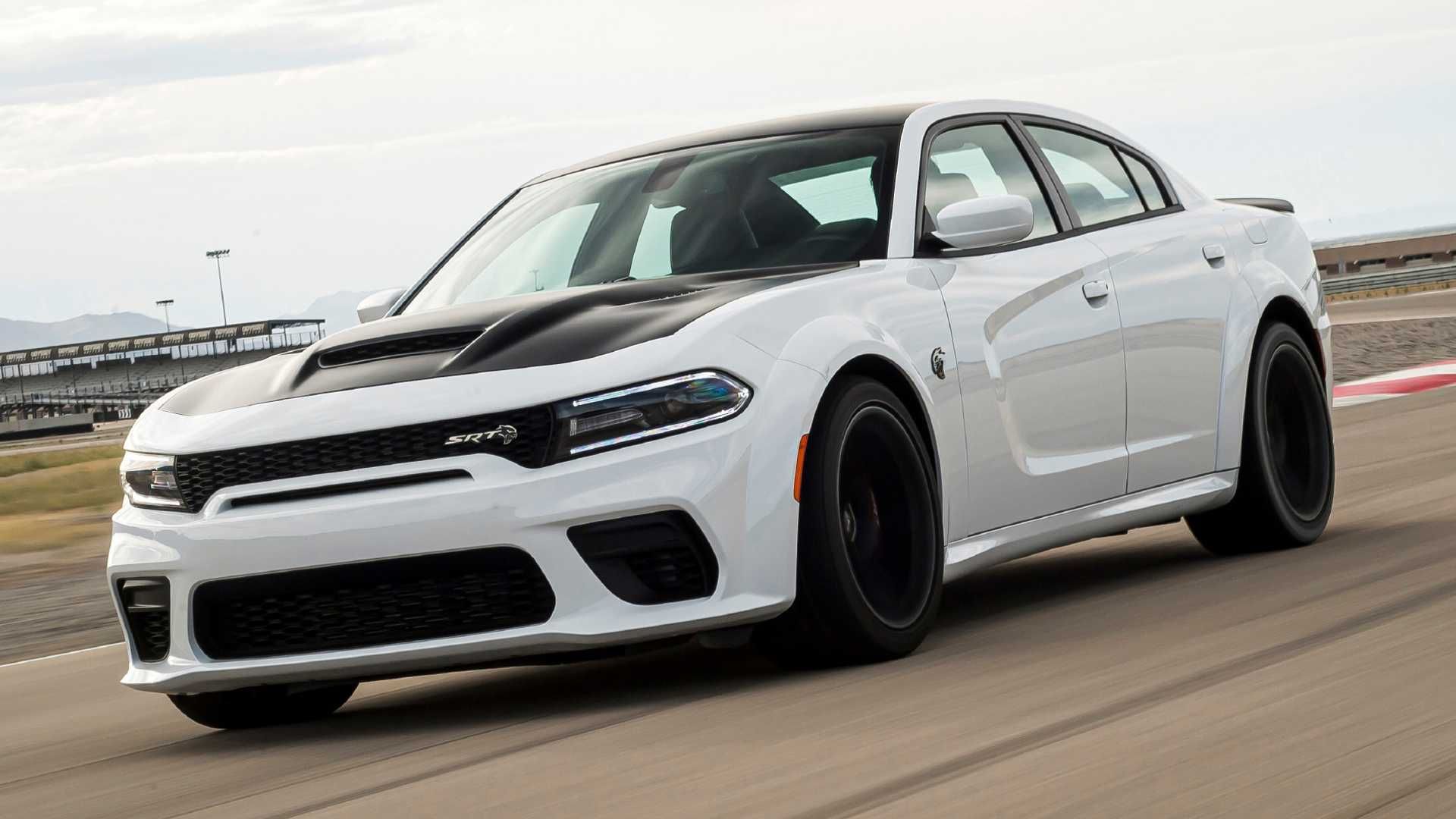 White Knuckle 2021 Dodge Charger SRT Hellcat Redeye speeding on the track