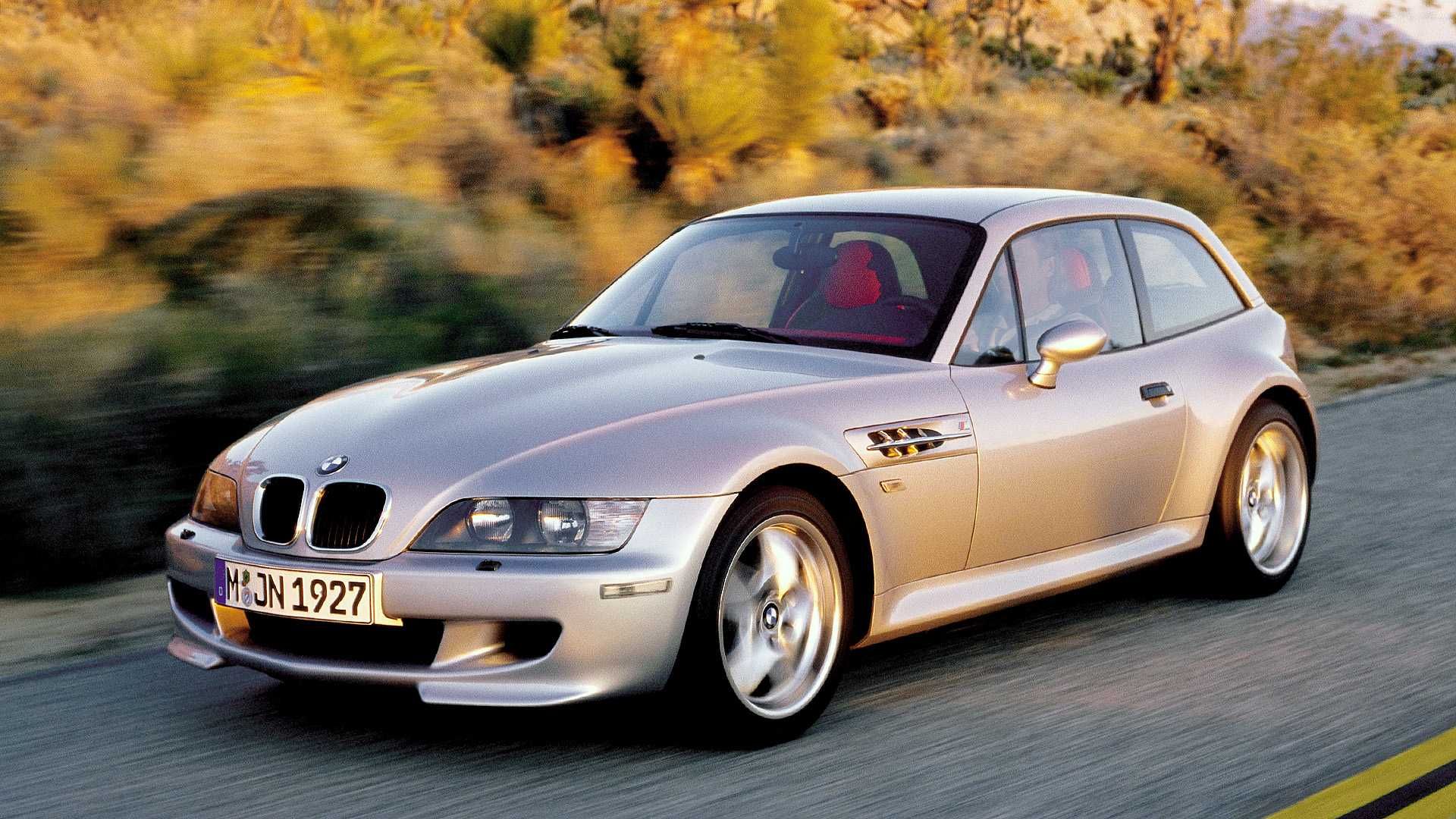 Titanium Silver Metallic BMW Z3 Coupe speeding on a road