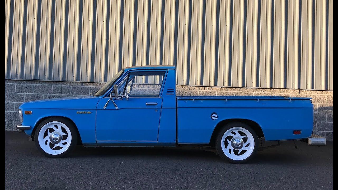 blue Chevy Luv from the side