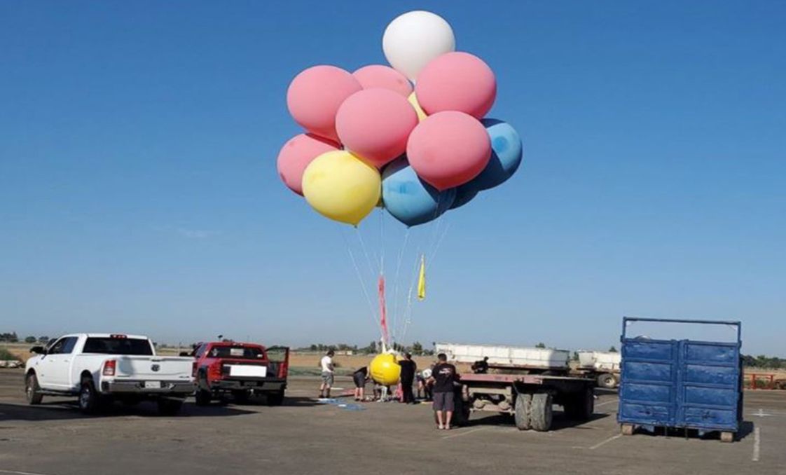 David Blaine performs his balloon stunt outside Fresno California