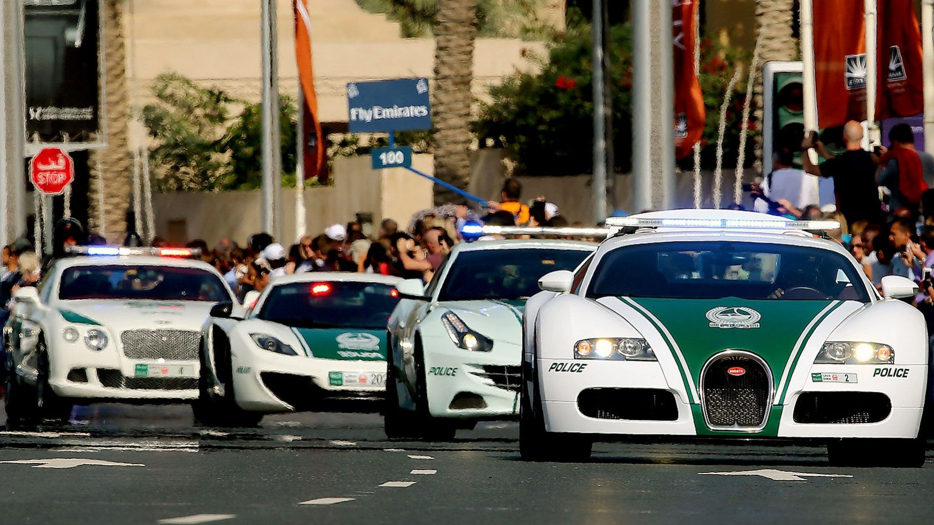Dubai police's ultra-luxury fleet marching in the streets of Dubai