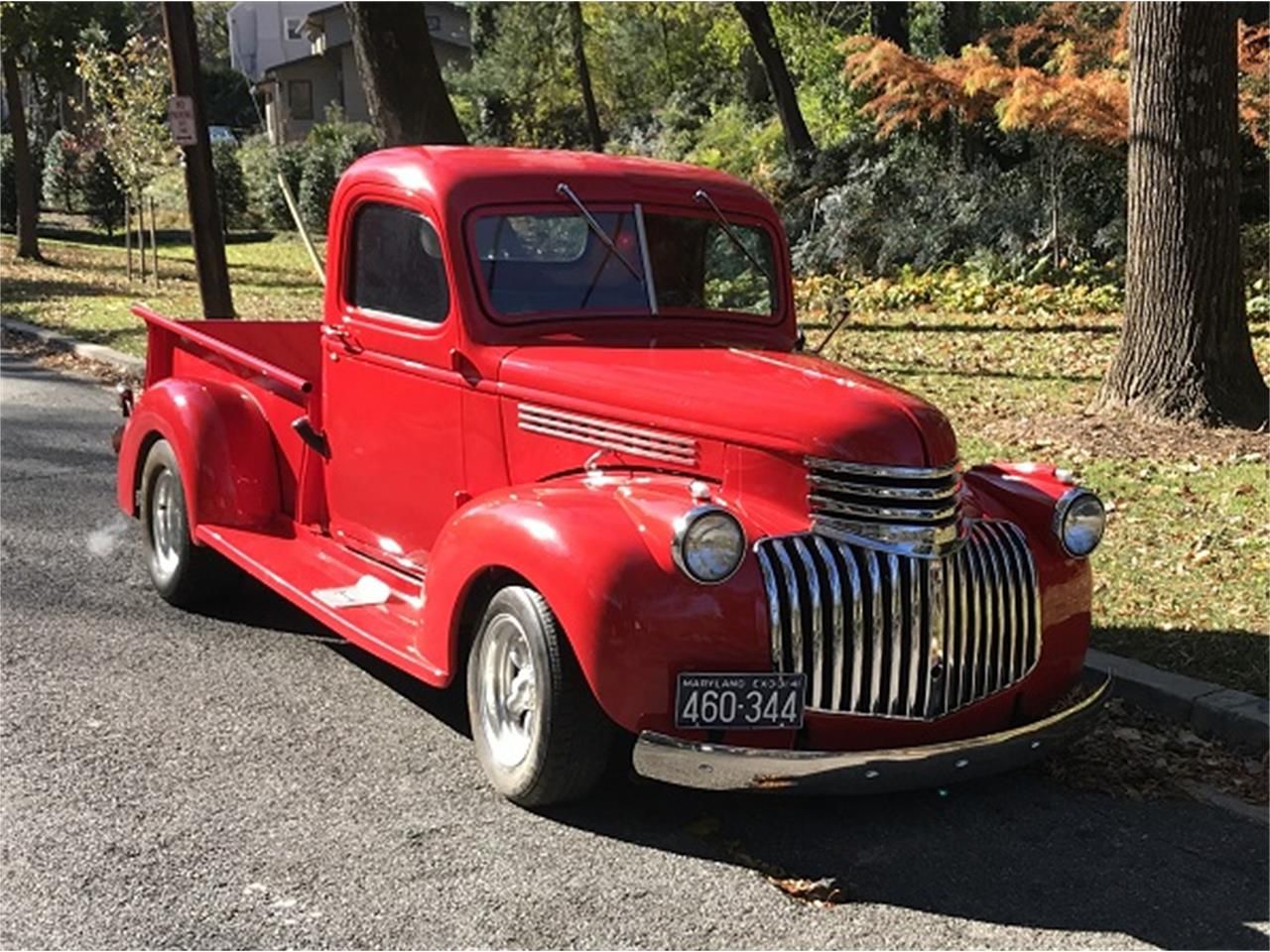 red classic truck with upgraded grilles