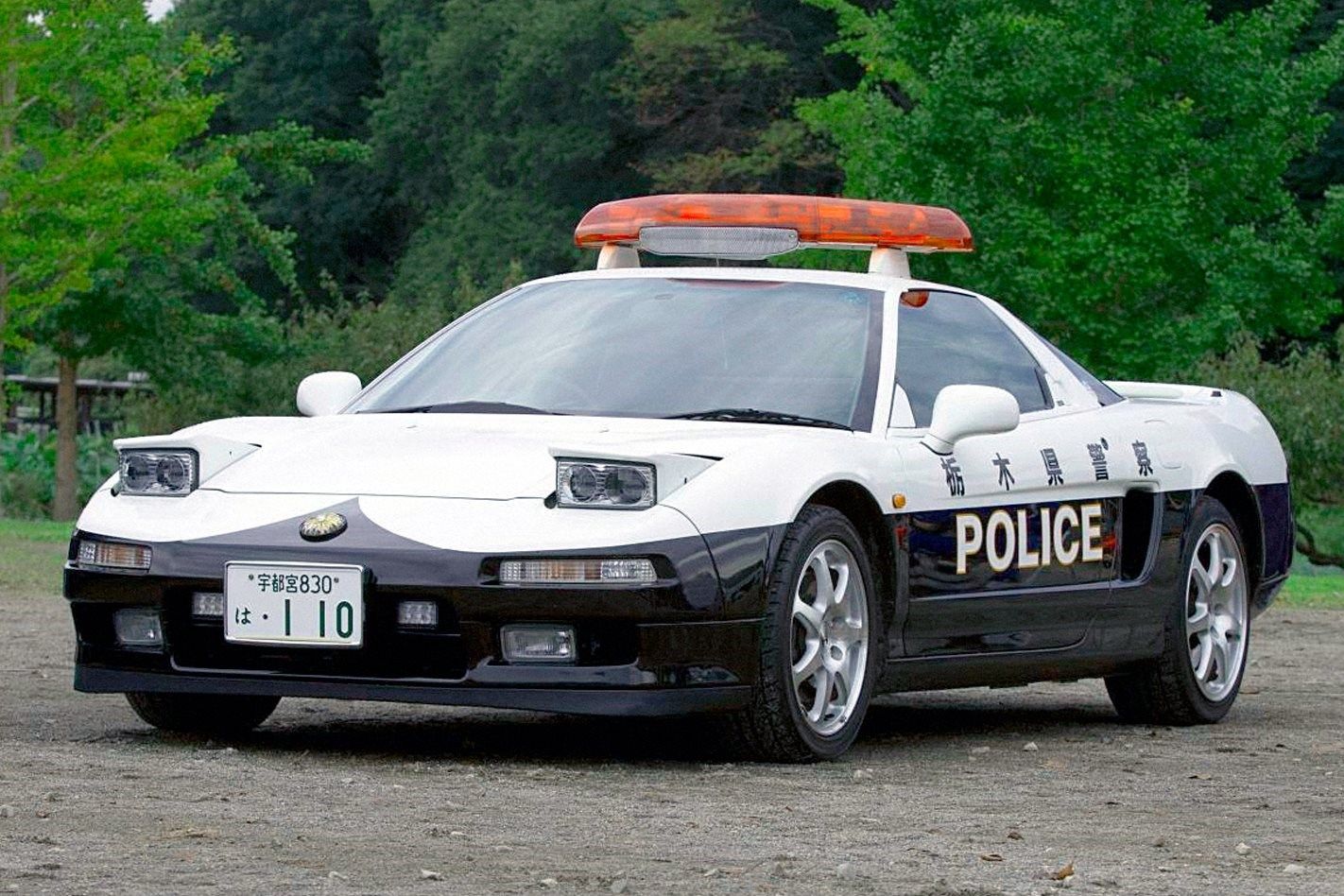 Black and white Honda NSX police vehicle 
