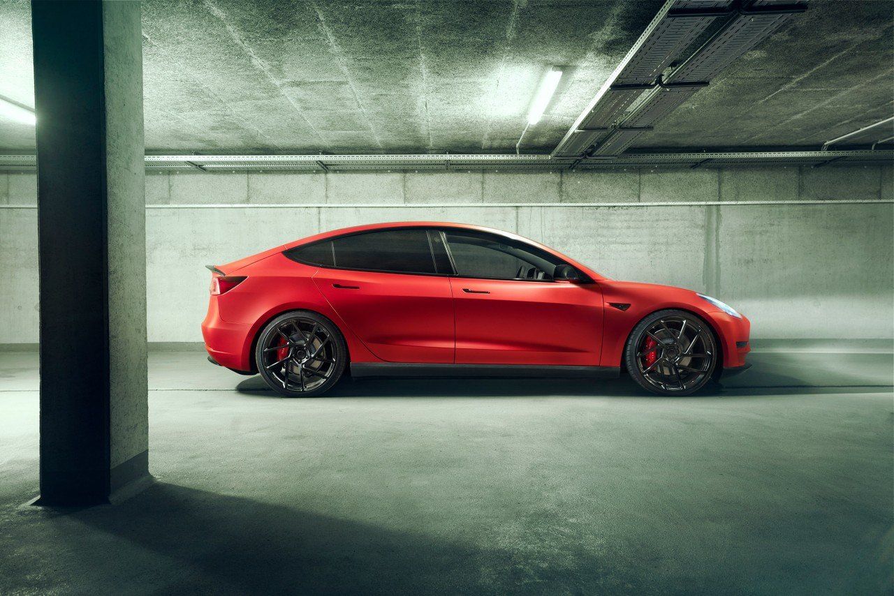 Custom wheels and aerodynamics offer to set the Tesla apart.