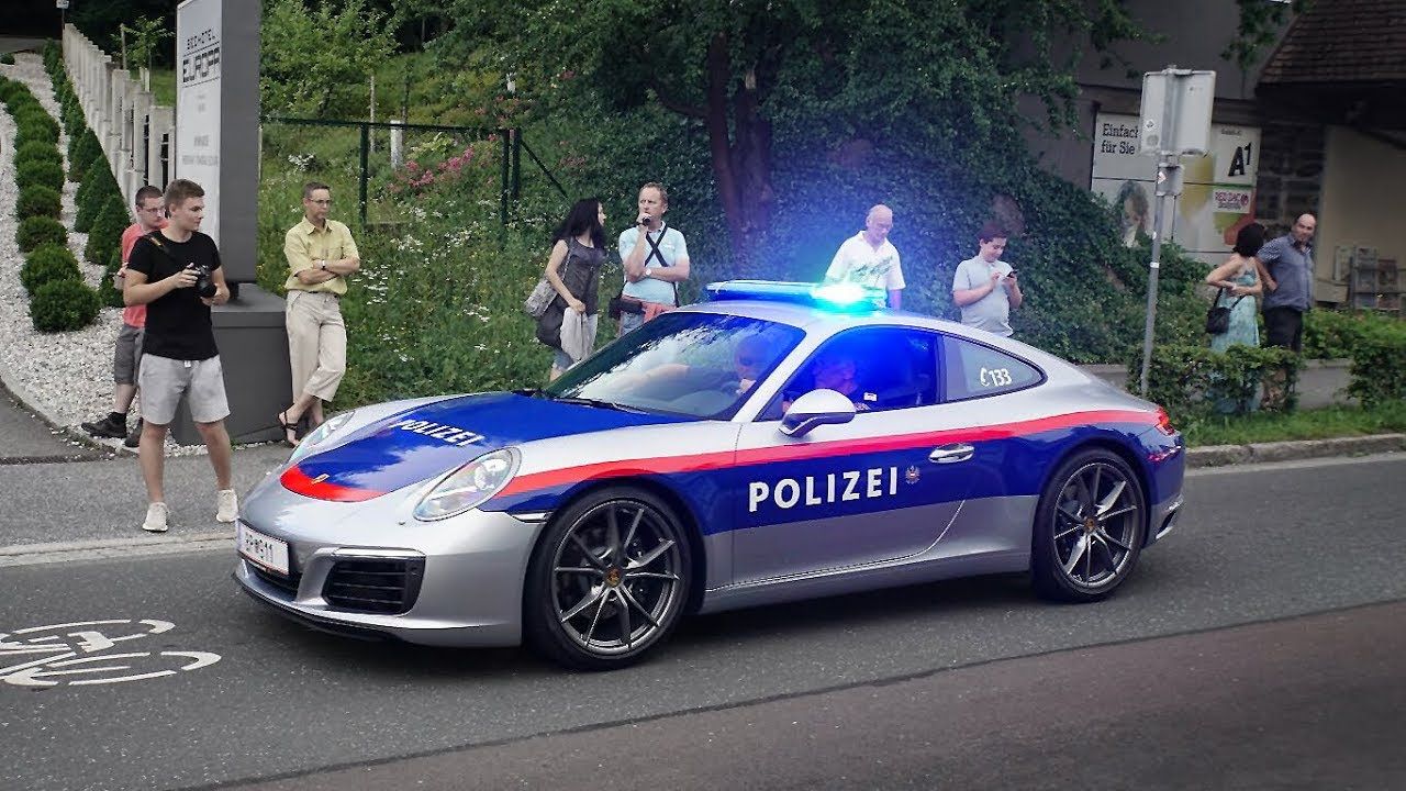 Porsche 911 police car in an urban street