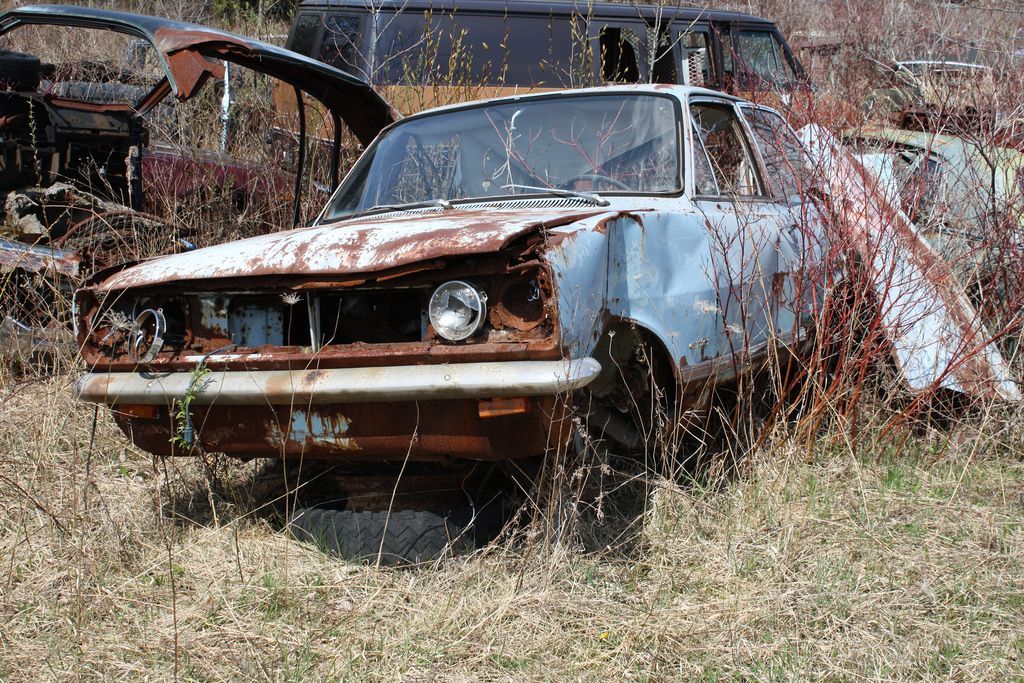 Vauxhall Viva Firenza rusting in junkyard