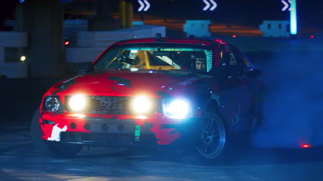 Diego higa drifiting in his 2006 ford mustang gt
