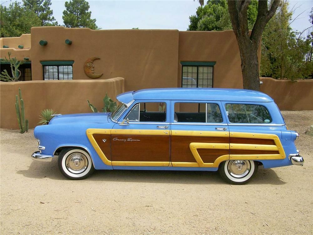 A 1953 Ford Country Squire with a wood panel rather than a wood body.