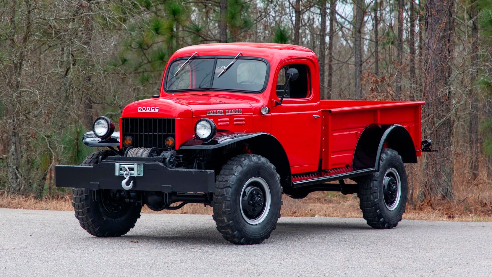 Red Dodge Power Wagon on an autumn day