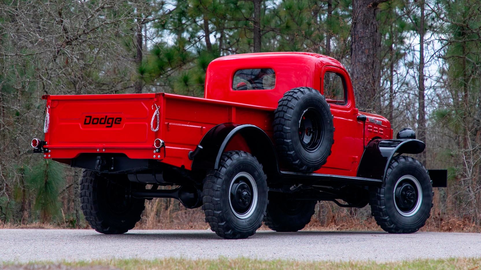 Red Dodge Power Wagon on an autumn day
