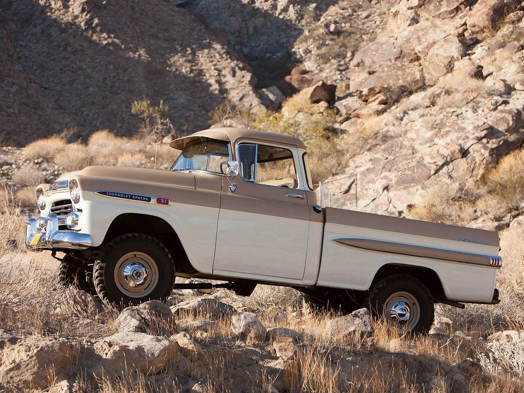 Satin beige and white 1959 Chevrolet 3100 Apache Fleetside Deluxe on mountains
