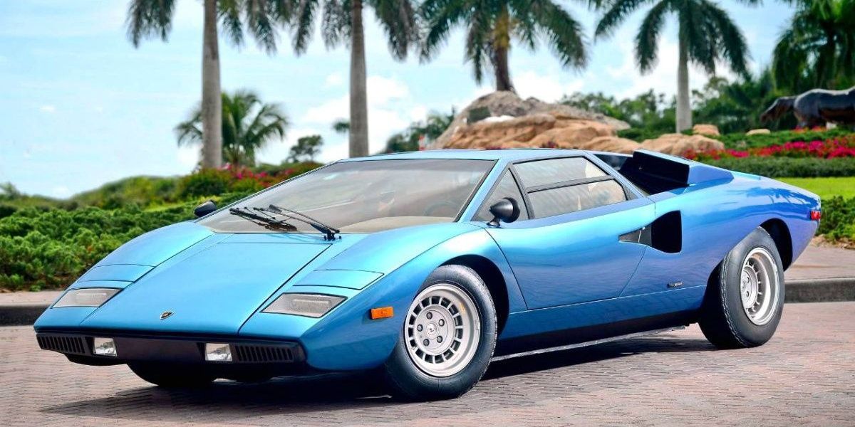 A Blue 1974 Lamborghini Countach Parked On The Driveway Of A Beachside Resort