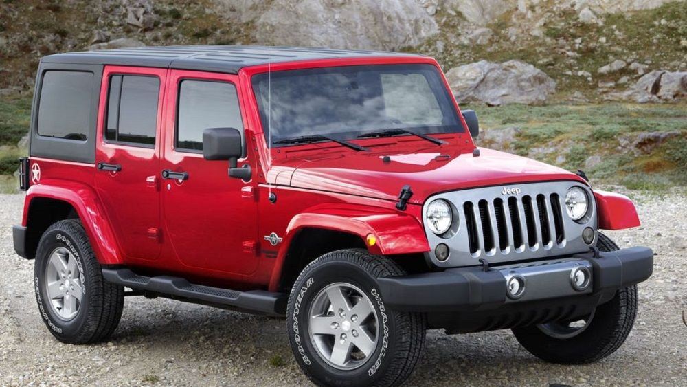 Red 2014 Jeep Wrangler Unlimited off-road