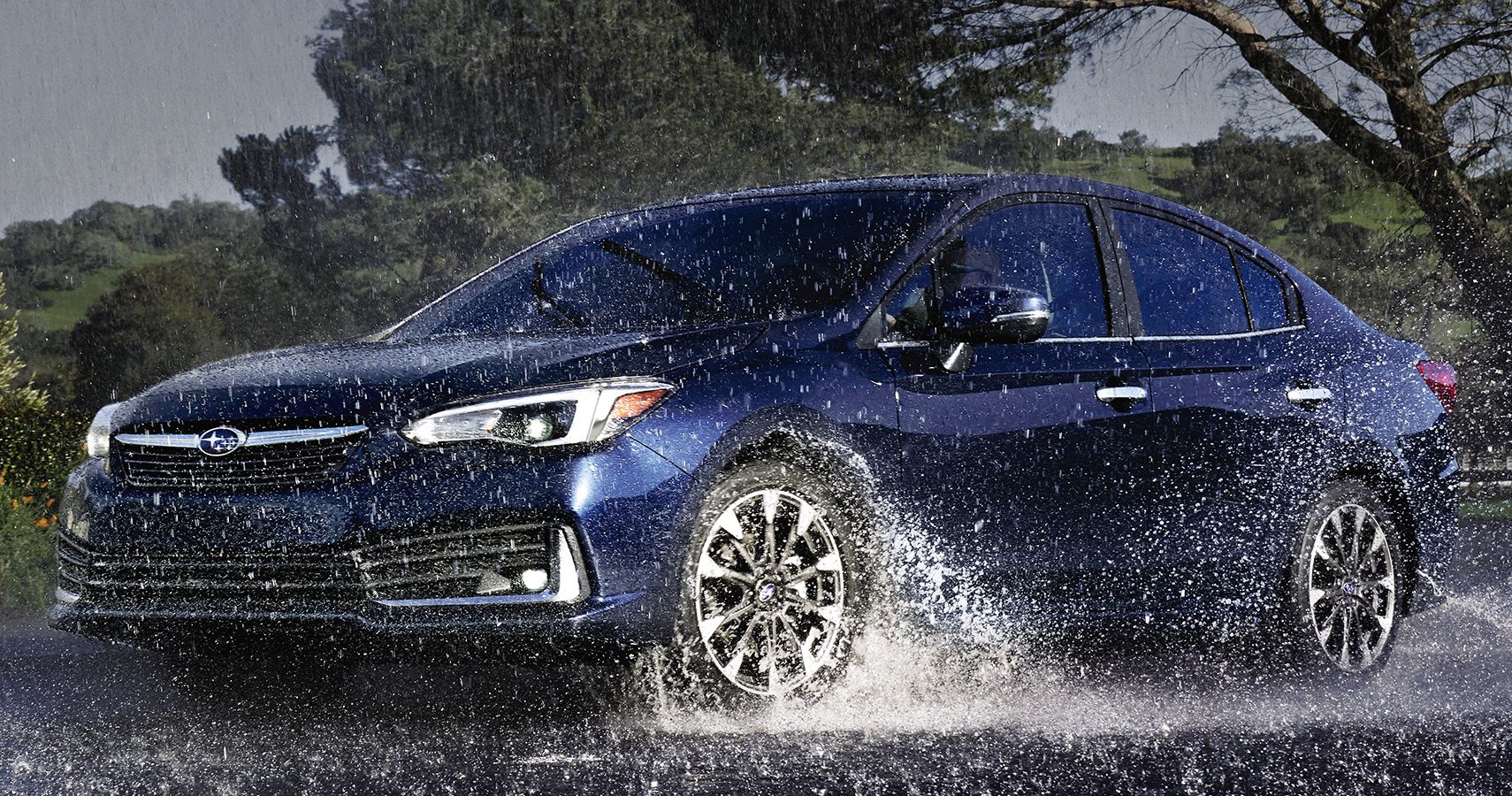 Subaru Impreza sedan rain