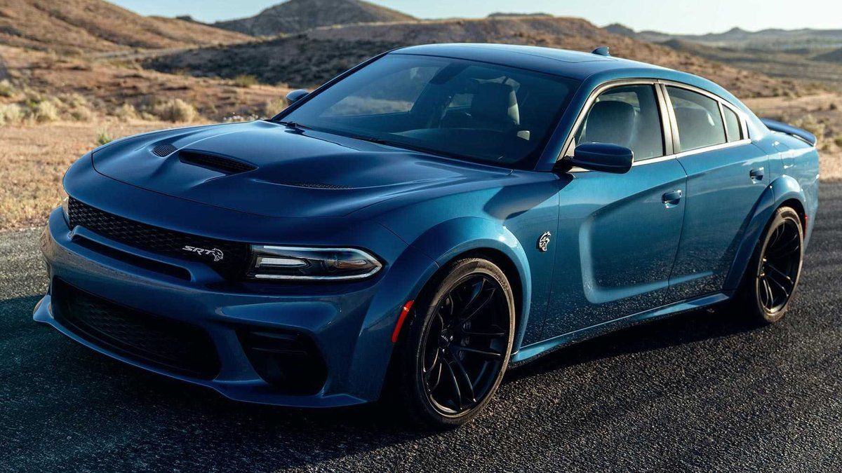 A 2021 Dodge Charger Scat Pack is on a road.