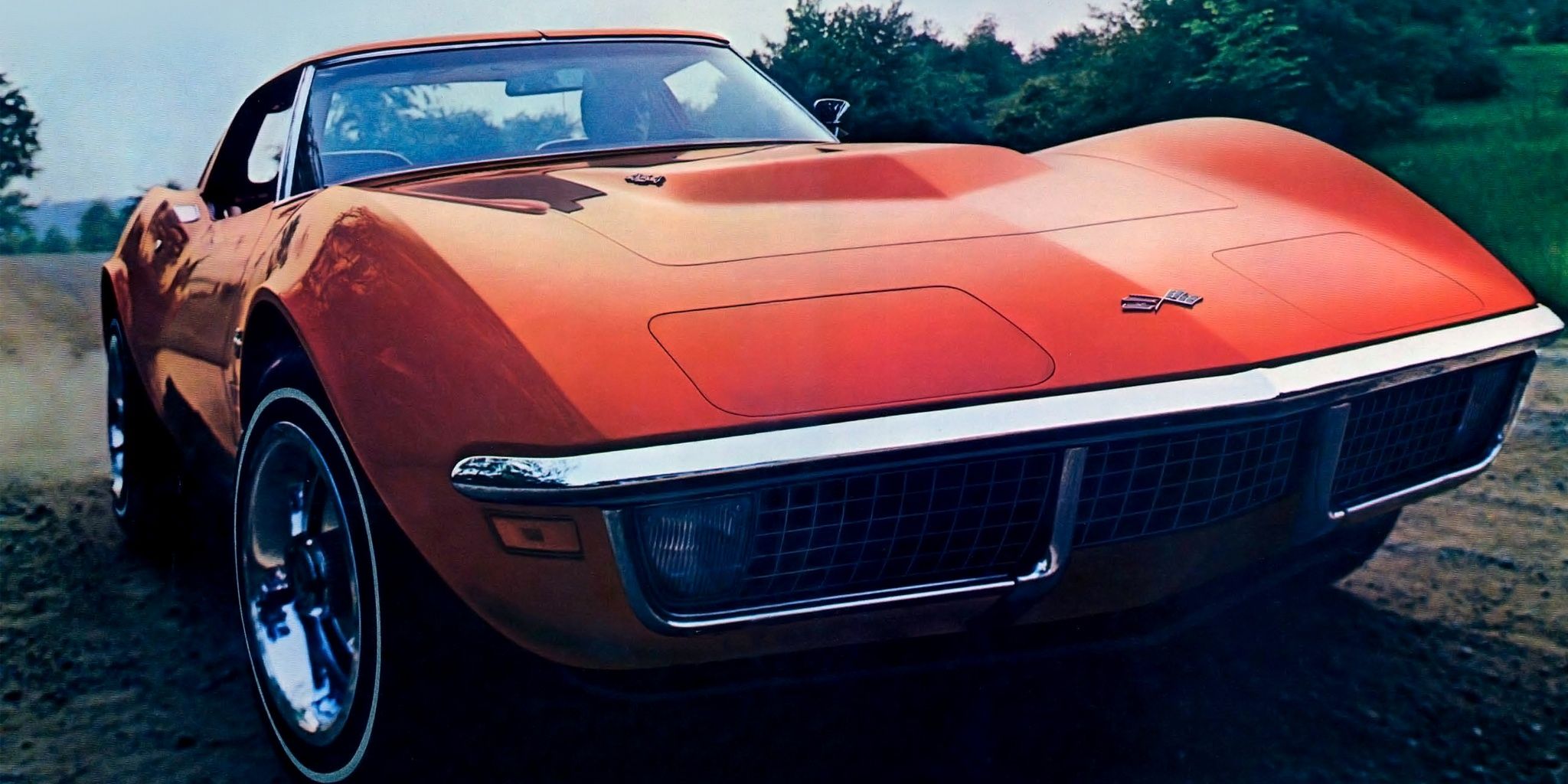 A close up shot of a red 1971 C3 Chevrolet Corvette