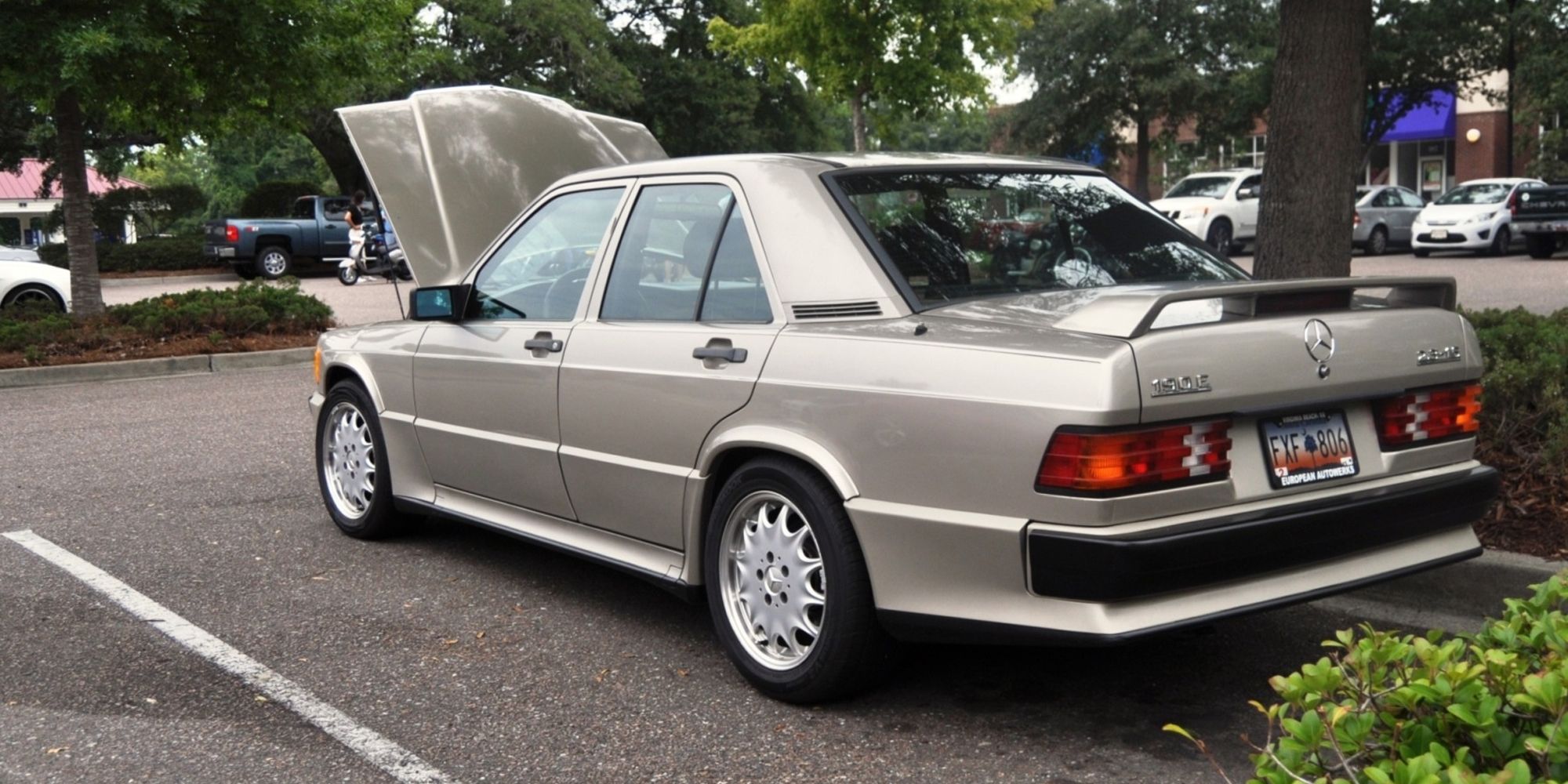 The rear of the 190E with the hood up