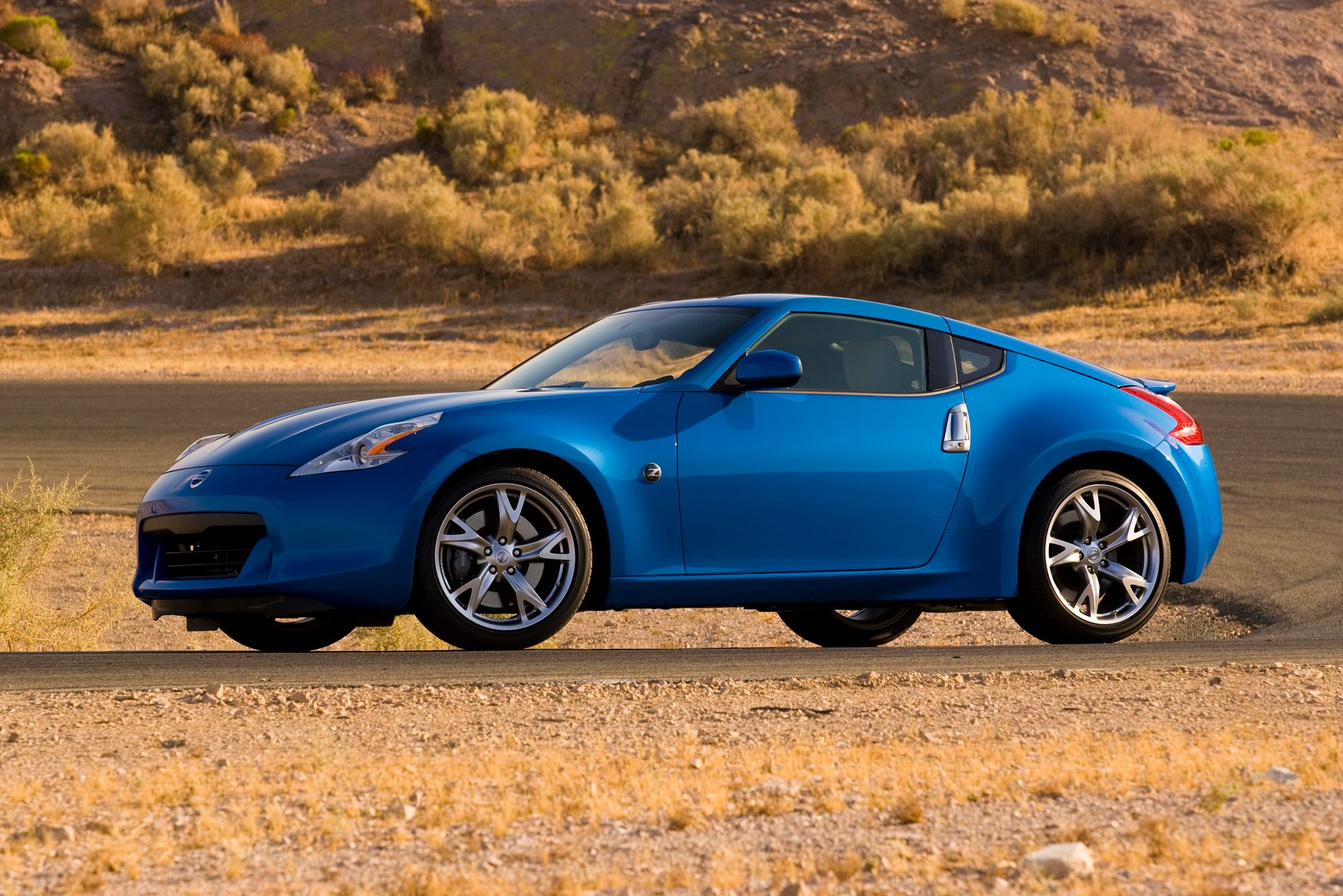 Blue nissan 370z in the hills