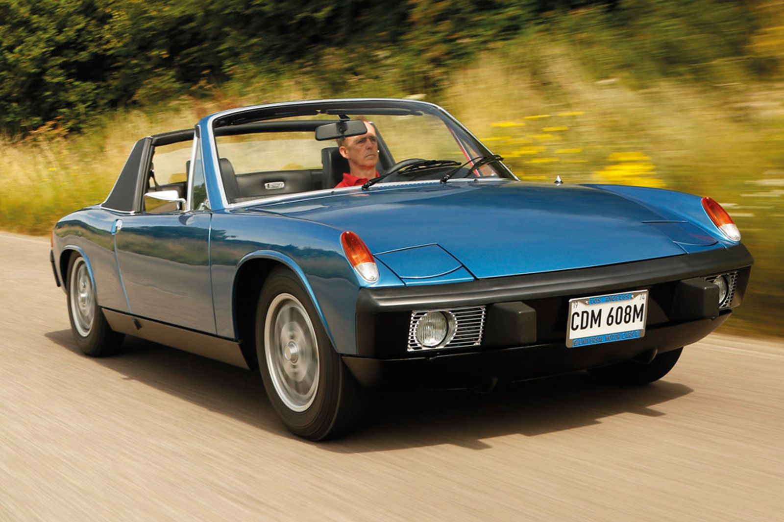 Porsche 914 driving on the road