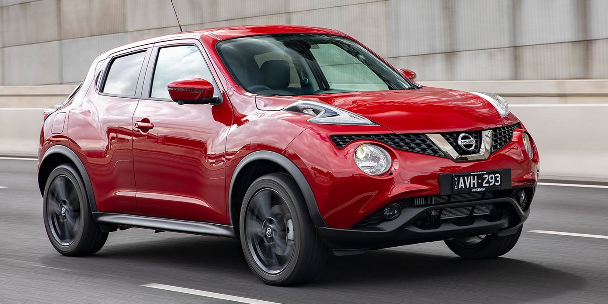 Red Nissan Juke On The Move