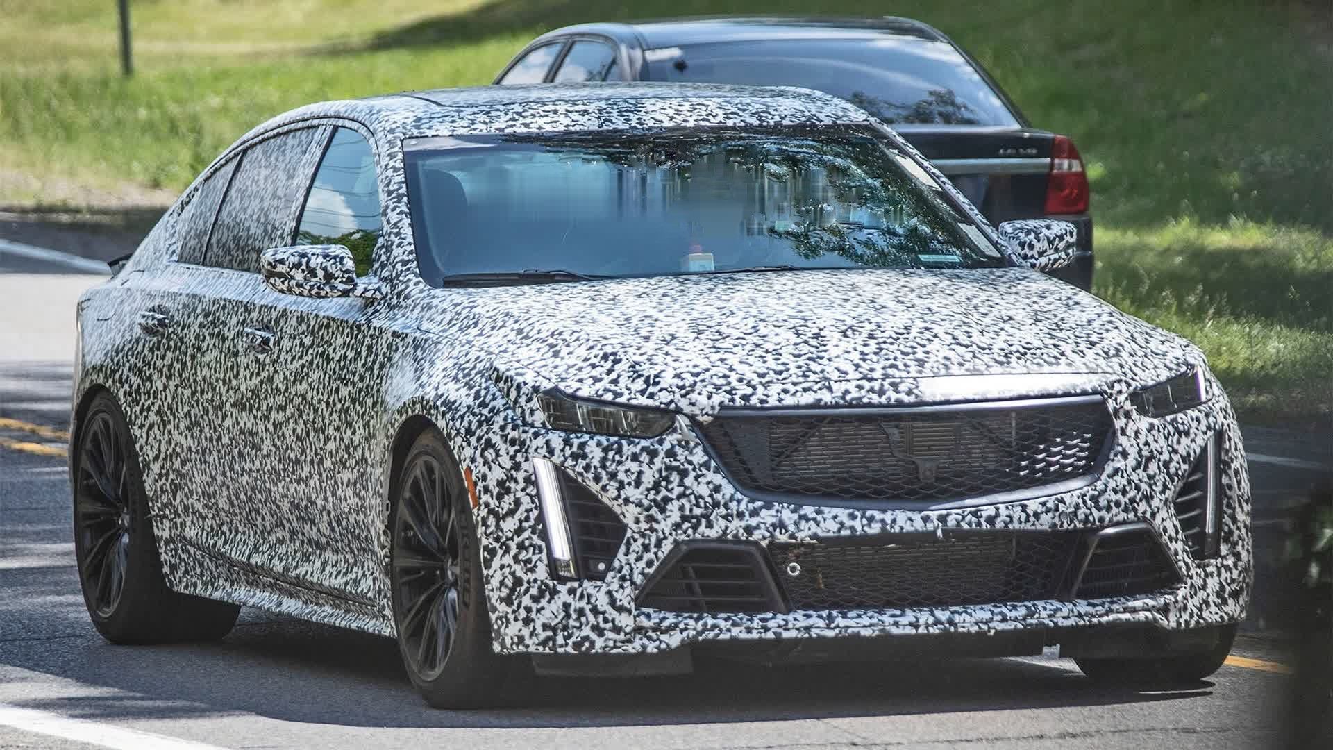 cadillac ct-v camouflaged front third quarter view