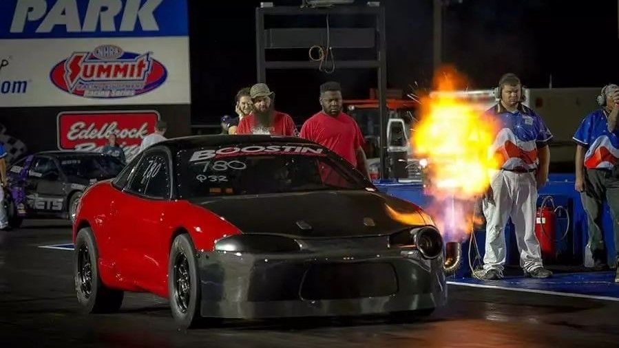 1800 hp mitsubishi eclipse red demon spiting fire front third quarter action view