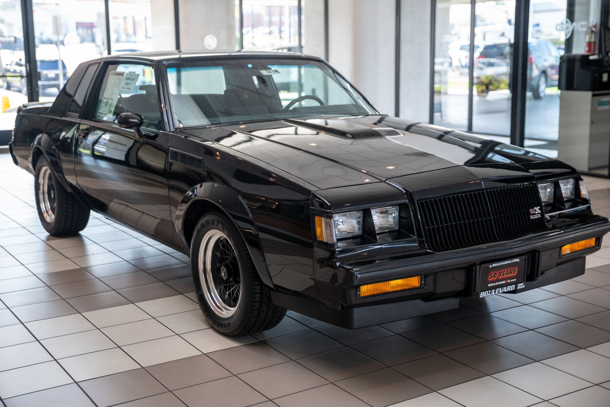1987 Buick GNX in a showroom
