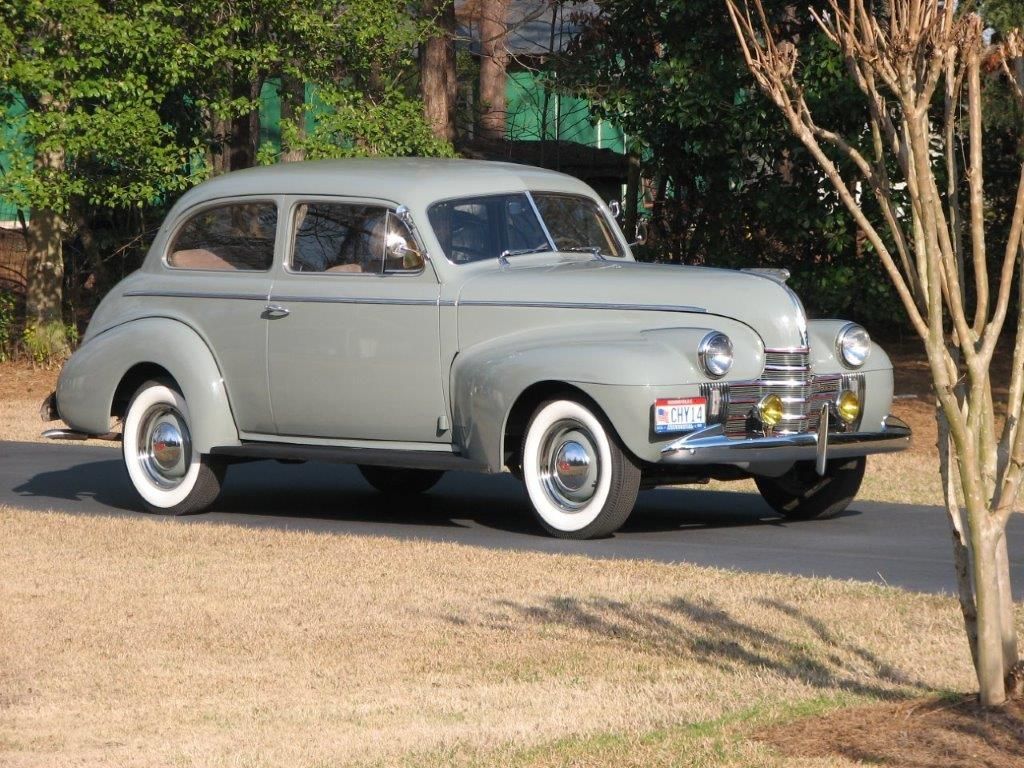 1940 Oldsmobile classic parked