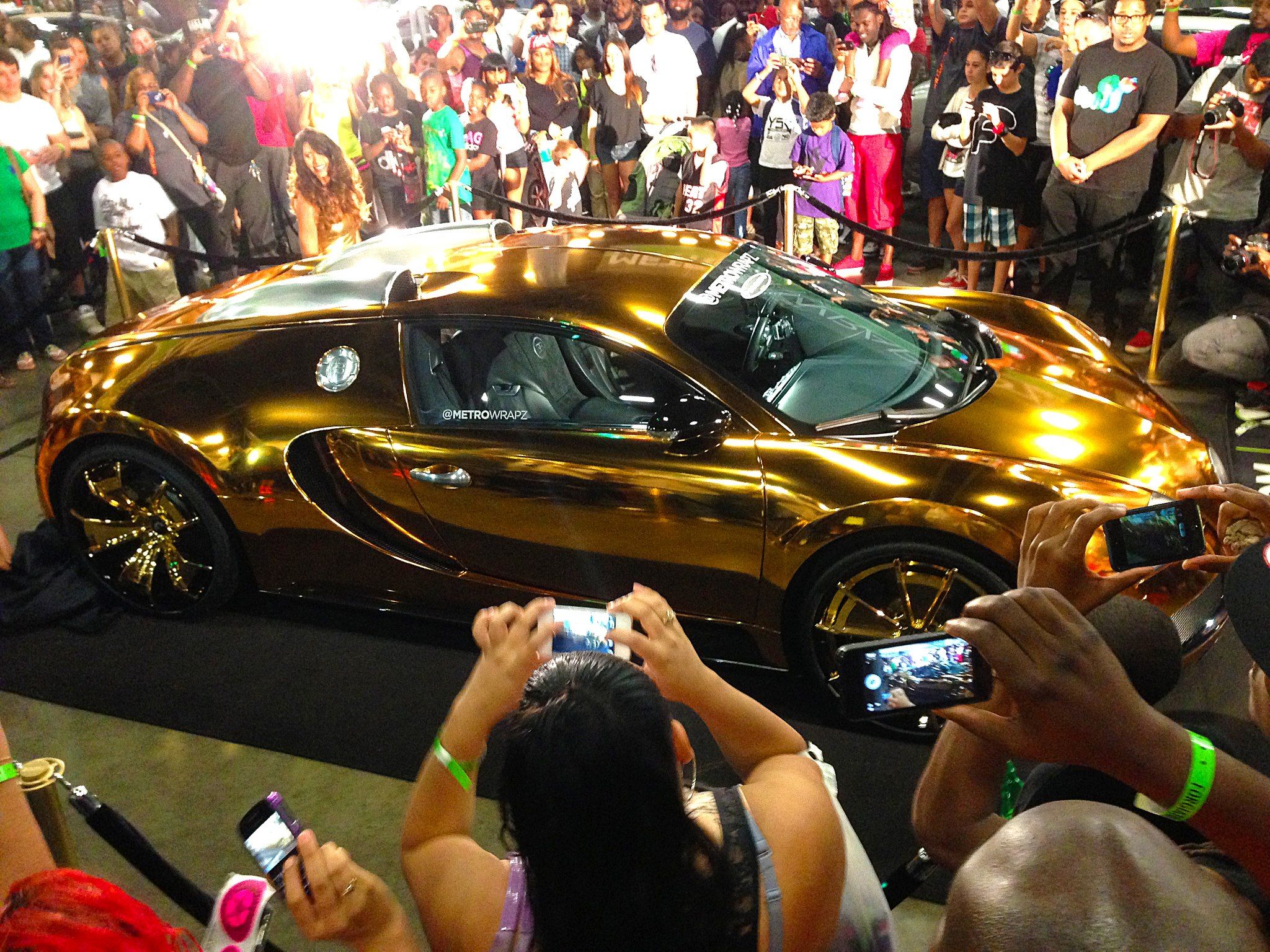 Flo Rida’s Gold Bugatti Veyron at a car show